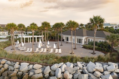 Enjoy relaxed coastal living in this 2 BR 2 BA upper-level end on The Seabrook Island Club in South Carolina - for sale on GolfHomes.com, golf home, golf lot