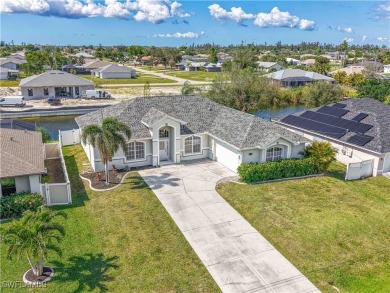 Welcome to this stunning waterfront residence in Cape Coral on Palmetto-Pine Country Club in Florida - for sale on GolfHomes.com, golf home, golf lot