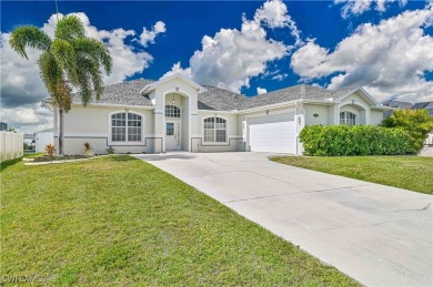 Welcome to this stunning waterfront residence in Cape Coral on Palmetto-Pine Country Club in Florida - for sale on GolfHomes.com, golf home, golf lot