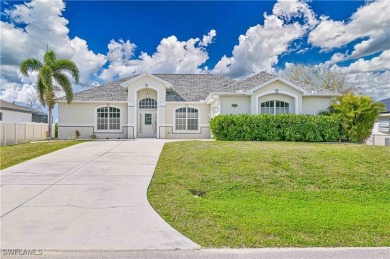 Welcome to this stunning waterfront residence in Cape Coral on Palmetto-Pine Country Club in Florida - for sale on GolfHomes.com, golf home, golf lot