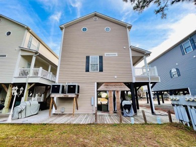 JUST LISTED! WELL BUILT 4 BED/3 BATH RAISED BEACH HOUSE IN OCEAN on Prestwick Country Club in South Carolina - for sale on GolfHomes.com, golf home, golf lot