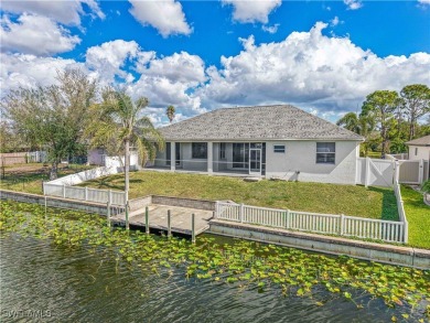 Welcome to this stunning waterfront residence in Cape Coral on Palmetto-Pine Country Club in Florida - for sale on GolfHomes.com, golf home, golf lot