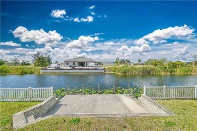 Welcome to this stunning waterfront residence in Cape Coral on Palmetto-Pine Country Club in Florida - for sale on GolfHomes.com, golf home, golf lot