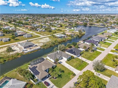 Welcome to this stunning waterfront residence in Cape Coral on Palmetto-Pine Country Club in Florida - for sale on GolfHomes.com, golf home, golf lot