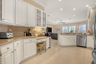 Discover this spacious 4-bedroom, 3-bath pool home in the on PGA National Estates Golf Course in Florida - for sale on GolfHomes.com, golf home, golf lot