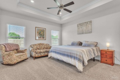 This beautifully designed 4-bedroom, 3-bathroom home with a on Tiger Point Golf and Country Club in Florida - for sale on GolfHomes.com, golf home, golf lot