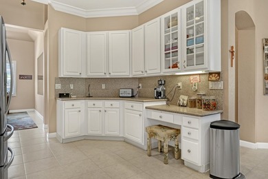 Discover this spacious 4-bedroom, 3-bath pool home in the on PGA National Estates Golf Course in Florida - for sale on GolfHomes.com, golf home, golf lot