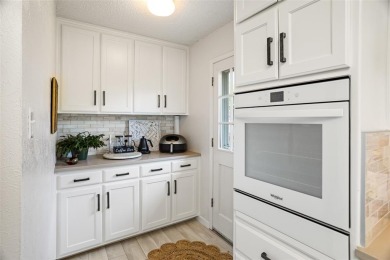 Welcome to your dream retreat! This beautifully remodeled on De Cordova Bend Country Club in Texas - for sale on GolfHomes.com, golf home, golf lot
