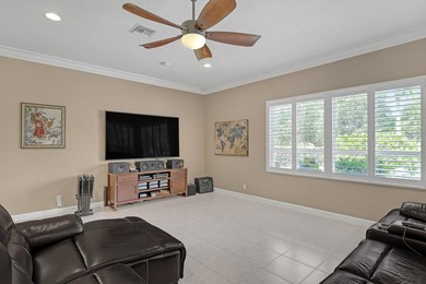 Discover this spacious 4-bedroom, 3-bath pool home in the on PGA National Estates Golf Course in Florida - for sale on GolfHomes.com, golf home, golf lot