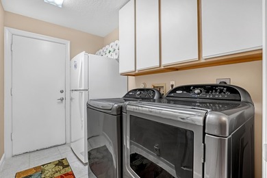 Discover this spacious 4-bedroom, 3-bath pool home in the on PGA National Estates Golf Course in Florida - for sale on GolfHomes.com, golf home, golf lot