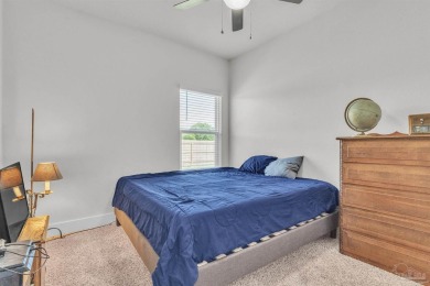 This beautifully designed 4-bedroom, 3-bathroom home with a on Tiger Point Golf and Country Club in Florida - for sale on GolfHomes.com, golf home, golf lot