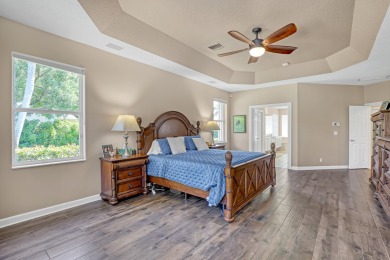 Discover this spacious 4-bedroom, 3-bath pool home located in on PGA National Estates Golf Course in Florida - for sale on GolfHomes.com, golf home, golf lot