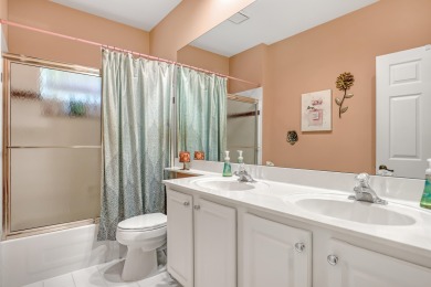 Discover this spacious 4-bedroom, 3-bath pool home located in on PGA National Estates Golf Course in Florida - for sale on GolfHomes.com, golf home, golf lot