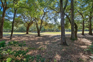 Positioned along the 14th fairway of Wachesaw Plantation's on Wachesaw Plantation Club in South Carolina - for sale on GolfHomes.com, golf home, golf lot