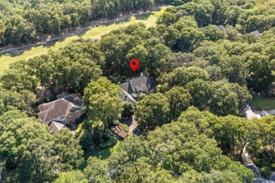 Positioned along the 14th fairway of Wachesaw Plantation's on Wachesaw Plantation Club in South Carolina - for sale on GolfHomes.com, golf home, golf lot
