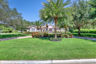Discover this spacious 4-bedroom, 3-bath pool home located in on PGA National Estates Golf Course in Florida - for sale on GolfHomes.com, golf home, golf lot