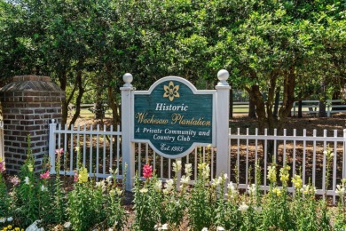 Positioned along the 14th fairway of Wachesaw Plantation's on Wachesaw Plantation Club in South Carolina - for sale on GolfHomes.com, golf home, golf lot