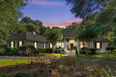 Positioned along the 14th fairway of Wachesaw Plantation's on Wachesaw Plantation Club in South Carolina - for sale on GolfHomes.com, golf home, golf lot