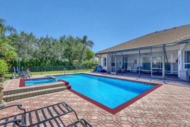 Discover this spacious 4-bedroom, 3-bath pool home located in on PGA National Estates Golf Course in Florida - for sale on GolfHomes.com, golf home, golf lot