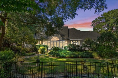 Positioned along the 14th fairway of Wachesaw Plantation's on Wachesaw Plantation Club in South Carolina - for sale on GolfHomes.com, golf home, golf lot