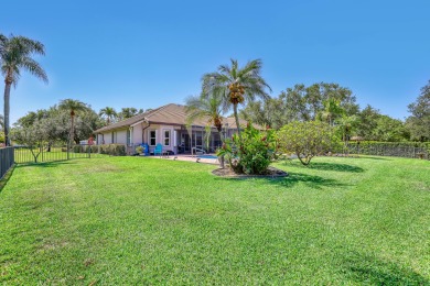 Discover this spacious 4-bedroom, 3-bath pool home located in on PGA National Estates Golf Course in Florida - for sale on GolfHomes.com, golf home, golf lot