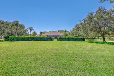 Discover this spacious 4-bedroom, 3-bath pool home located in on PGA National Estates Golf Course in Florida - for sale on GolfHomes.com, golf home, golf lot