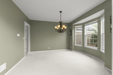 Nestled on one of the most coveted lots in Sterling Oaks, this on Streamwood Oaks Golf Club in Illinois - for sale on GolfHomes.com, golf home, golf lot