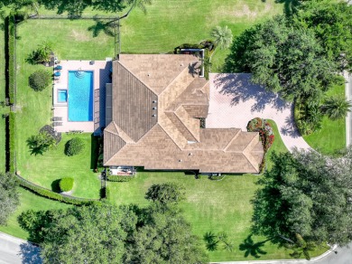 Discover this spacious 4-bedroom, 3-bath pool home located in on PGA National Estates Golf Course in Florida - for sale on GolfHomes.com, golf home, golf lot