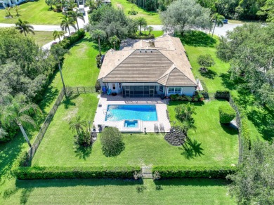 Discover this spacious 4-bedroom, 3-bath pool home located in on PGA National Estates Golf Course in Florida - for sale on GolfHomes.com, golf home, golf lot