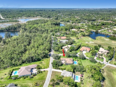 Discover this spacious 4-bedroom, 3-bath pool home located in on PGA National Estates Golf Course in Florida - for sale on GolfHomes.com, golf home, golf lot