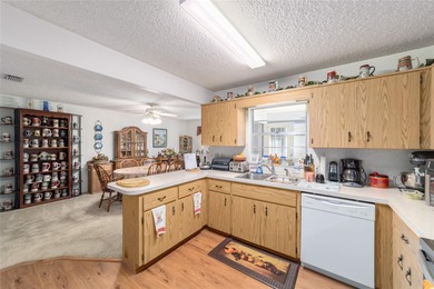 Ready to enjoy the relaxed, sunny Florida lifestyle? This on On Top of the World Golf Course in Florida - for sale on GolfHomes.com, golf home, golf lot