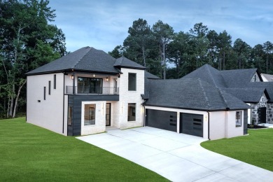 This contemporary home is brimming with amenities, featuring on Chenal Country Club - Bear Den Mountain in Arkansas - for sale on GolfHomes.com, golf home, golf lot