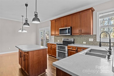 Step into a home designed for the way you live today. Offering on Highland Creek Golf Club in North Carolina - for sale on GolfHomes.com, golf home, golf lot