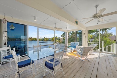 Stunning Lakefront Home Perfect for Nature Lovers Welcome to on The Dunes Golf and Tennis Club in Florida - for sale on GolfHomes.com, golf home, golf lot