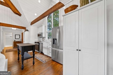 Dubbed *The Cottage on the Course,* this turnkey bungalow is on The Golf Club at Cuscowilla in Georgia - for sale on GolfHomes.com, golf home, golf lot