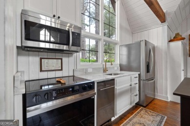 Dubbed *The Cottage on the Course,* this turnkey bungalow is on The Golf Club at Cuscowilla in Georgia - for sale on GolfHomes.com, golf home, golf lot