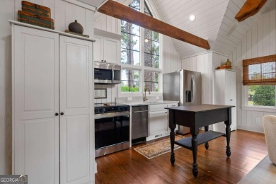 Dubbed *The Cottage on the Course,* this turnkey bungalow is on The Golf Club at Cuscowilla in Georgia - for sale on GolfHomes.com, golf home, golf lot