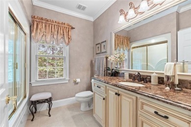 FIRST TIME ON THE MARKET! This exquisite 4-side blush brick on Royal Lakes Golf and Country Club in Georgia - for sale on GolfHomes.com, golf home, golf lot