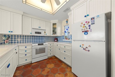 Stunning Lakefront Home Perfect for Nature Lovers Welcome to on The Dunes Golf and Tennis Club in Florida - for sale on GolfHomes.com, golf home, golf lot