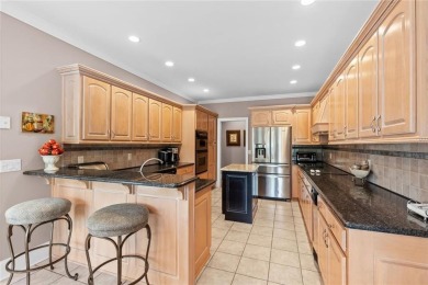 FIRST TIME ON THE MARKET! This exquisite 4-side blush brick on Royal Lakes Golf and Country Club in Georgia - for sale on GolfHomes.com, golf home, golf lot