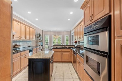 FIRST TIME ON THE MARKET! This exquisite 4-side blush brick on Royal Lakes Golf and Country Club in Georgia - for sale on GolfHomes.com, golf home, golf lot