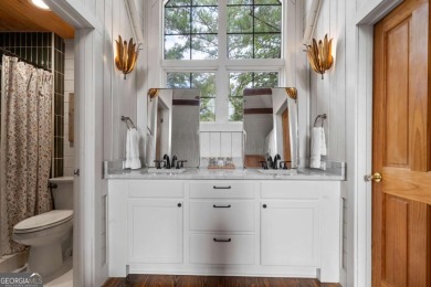 Dubbed *The Cottage on the Course,* this turnkey bungalow is on The Golf Club at Cuscowilla in Georgia - for sale on GolfHomes.com, golf home, golf lot