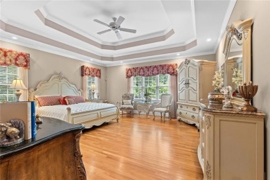 FIRST TIME ON THE MARKET! This exquisite 4-side blush brick on Royal Lakes Golf and Country Club in Georgia - for sale on GolfHomes.com, golf home, golf lot