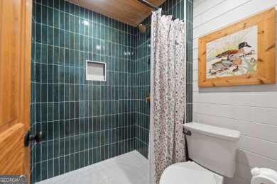 Dubbed *The Cottage on the Course,* this turnkey bungalow is on The Golf Club at Cuscowilla in Georgia - for sale on GolfHomes.com, golf home, golf lot
