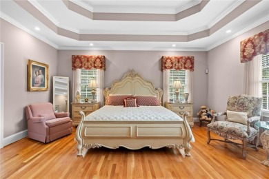 FIRST TIME ON THE MARKET! This exquisite 4-side blush brick on Royal Lakes Golf and Country Club in Georgia - for sale on GolfHomes.com, golf home, golf lot