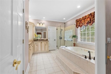 FIRST TIME ON THE MARKET! This exquisite 4-side blush brick on Royal Lakes Golf and Country Club in Georgia - for sale on GolfHomes.com, golf home, golf lot