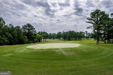 Dubbed *The Cottage on the Course,* this turnkey bungalow is on The Golf Club at Cuscowilla in Georgia - for sale on GolfHomes.com, golf home, golf lot