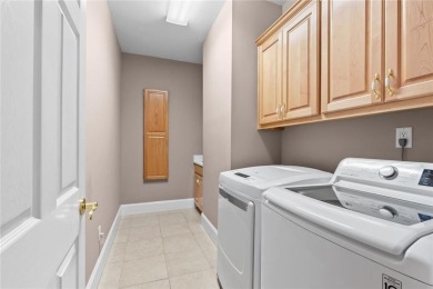 FIRST TIME ON THE MARKET! This exquisite 4-side blush brick on Royal Lakes Golf and Country Club in Georgia - for sale on GolfHomes.com, golf home, golf lot