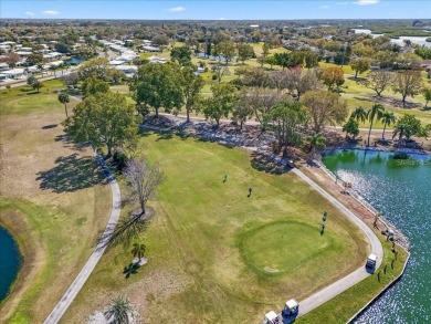 One or more photo(s) has been virtually staged. Priced to sell on River Isles Golf Club in Florida - for sale on GolfHomes.com, golf home, golf lot