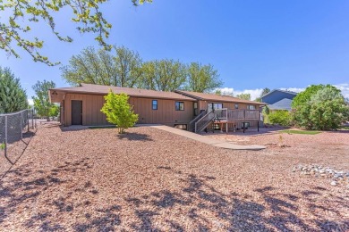 This Pueblo West beautiful brick home sits on the 7th fairway of on Desert Hawk At Pueblo West in Colorado - for sale on GolfHomes.com, golf home, golf lot